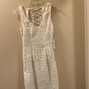 BRAND NEW with tags: white lace dress with ties in back